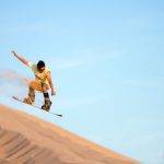 Sandboarding in Desert