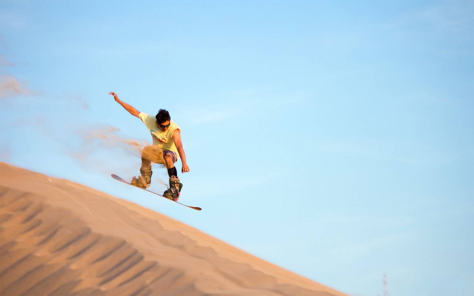 Sandboarding in Desert