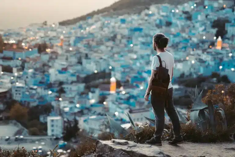 A Traveler standing in front of Chefchaouen