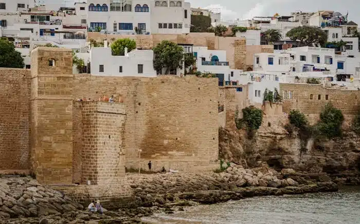 a stone wall with the Kasbah of Udayah on the side is a part of the best things to do in Rabat