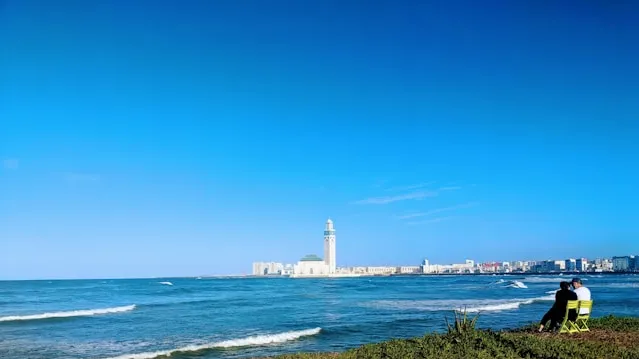 Two Couples Setting Safely in The city of Casablanca next to the Beach