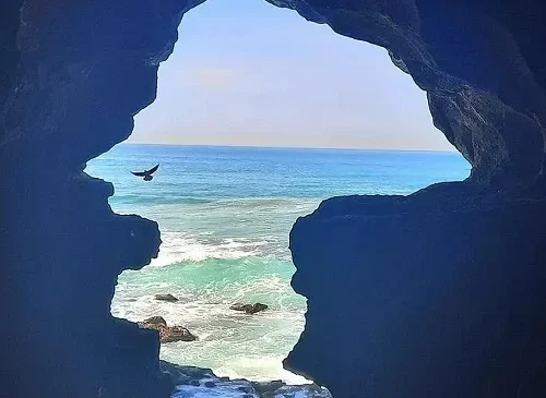 Atlantic opening at Hercules Cave near Tangier on a private 16-day Morocco tour from Casablanca